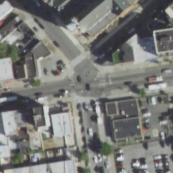 Aerial photo of Flushing Ave & Throop Ave, north at the top, with the camera's spot marked